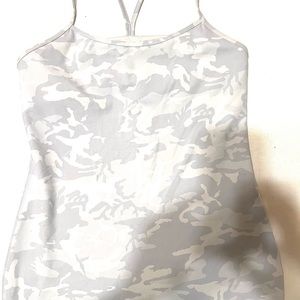Lululemon tank top size 12 with shelf bra. Has no pads.